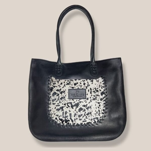 Cartera Tote Lirio cuero negro con panel pelo de vaca manchas, Rose Blanche