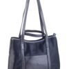 Cartera Celine Rose Blanche pelo vaca negro y cuero negro, vista frontal con manijas extendidas, artesanal Patagonia Argentina